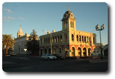 Two well preserved, grand buildings in a country town