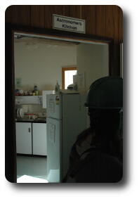 Photo through door into a kitchen