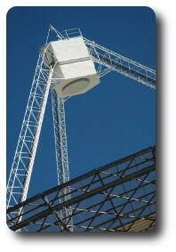 New, white hexagonal structure atop the dish tripod