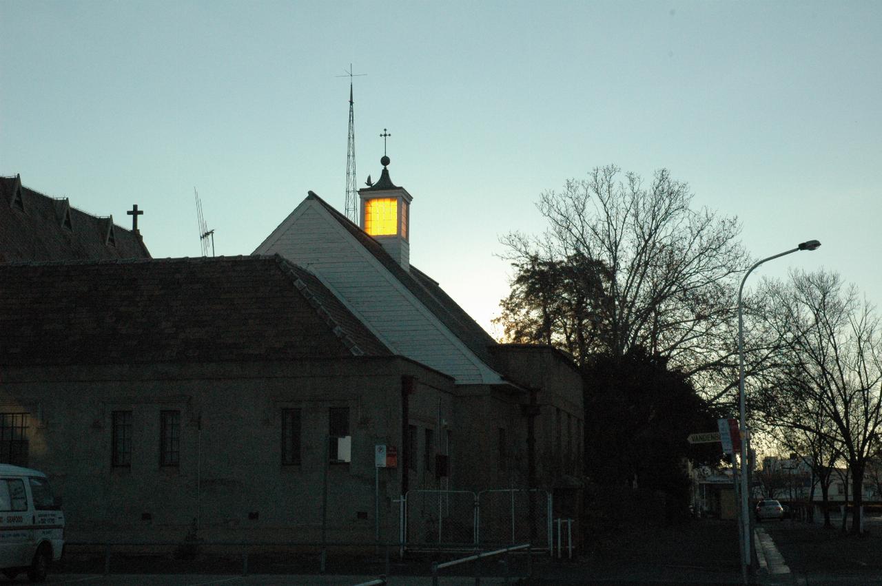 Building with illumated roof at top of roof