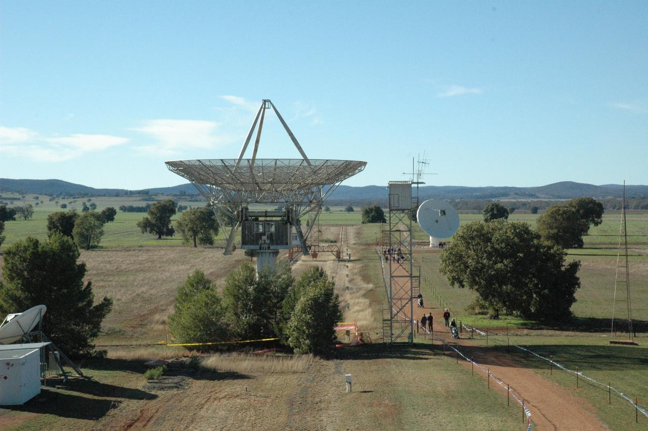 Two dishes in front, heading off to low hills in background