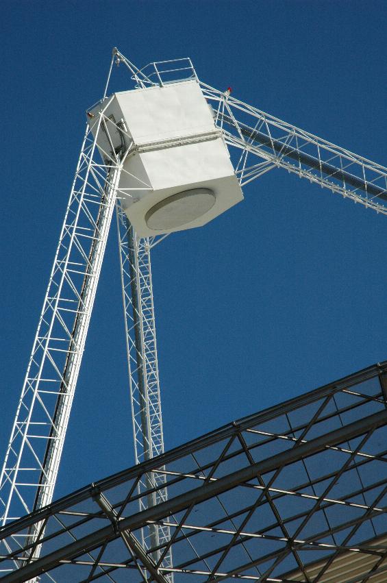 Close up of white pentagonal box above main telescope dish