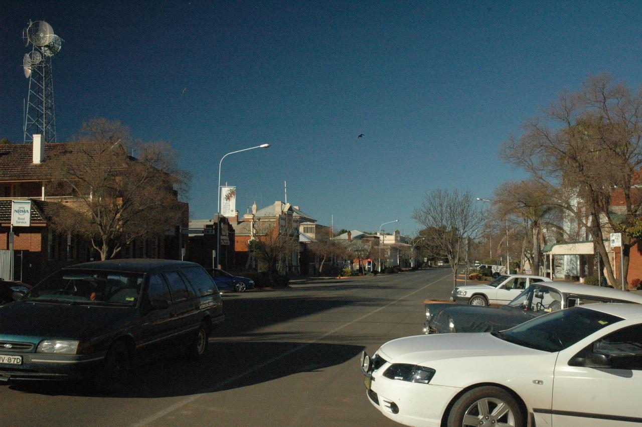 Small town street scene, with back to curb parking