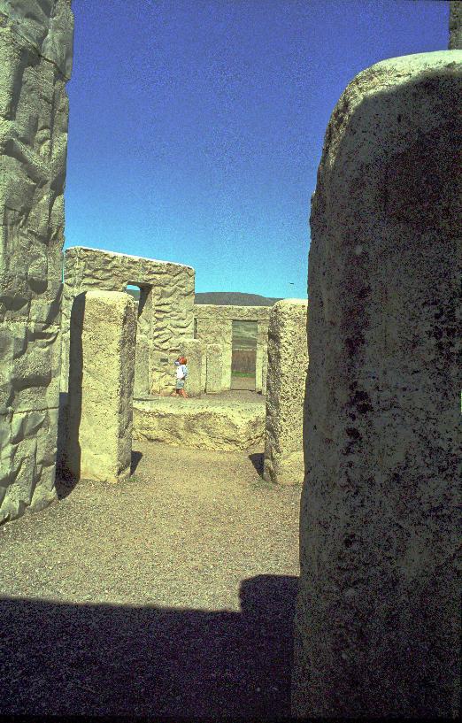 View through stone columns to horizontal stone used as altar
