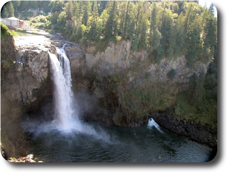 Waterfall with low flow and power station outflow at the base of falls.