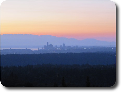 Distant skyline with orange tones in sky