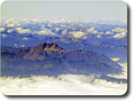 Mountains with cloud in valleys, and a few peaks