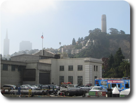 City buildings partly obscured by fog