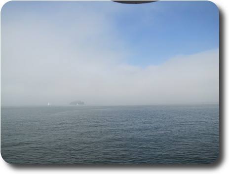 Fog around Alcatraz and some blue sky above
