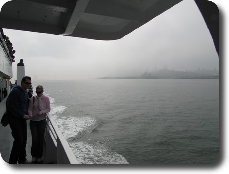 Dimly visible city skyline through fog