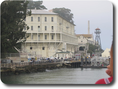 Wharf and 4 storey cream building adjacent