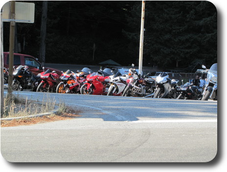 Line of motorcycles in front of restaurant