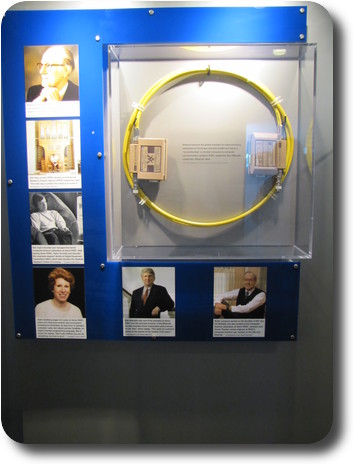 Circular yellow cable, terminators and photos of inventors