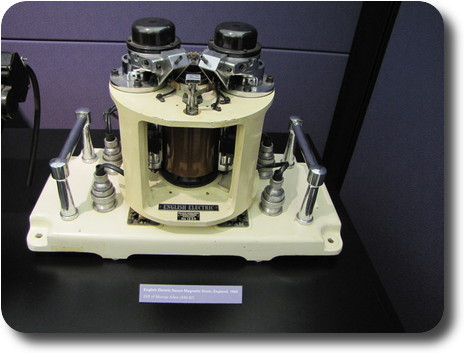 Open cylinder with brown coloured cylinder inside