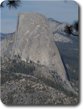 Gray dome of a rock, with left side cut off