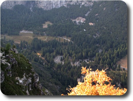 Looking down to valley floor, with roads and buildings visible
