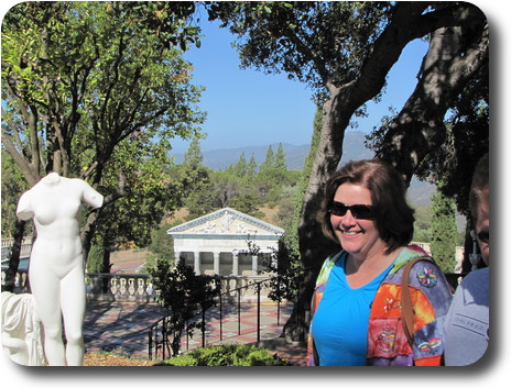 Greek temple facade on the north side pool with view to distant hills