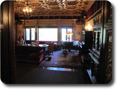 Large room, several sofas, table and chairs and other stuff