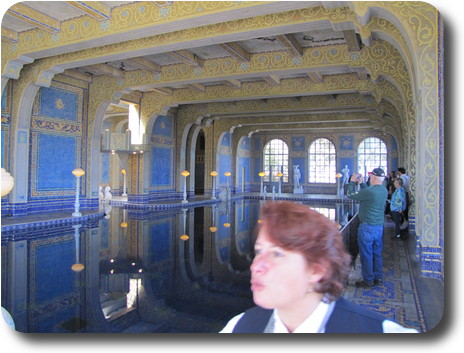 Blue themed enclosed swimming pool, T shaped layout