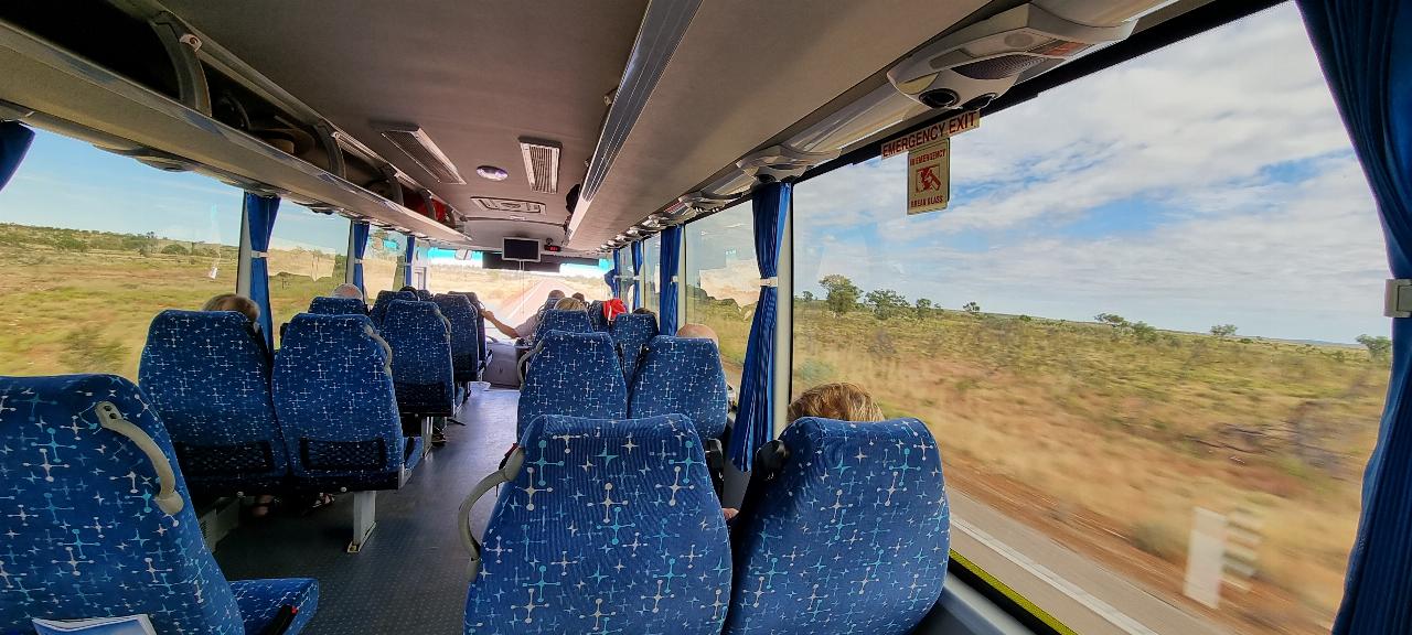 SJR21.d15: In the bus,  with seats removed