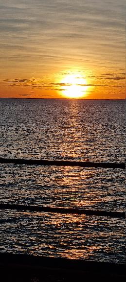 SJR21.d15: sun nearing the ocean horizon - II