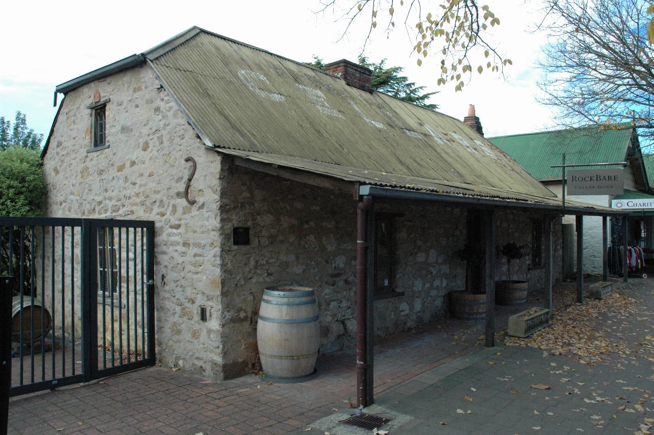 Small, old one level stone cottage leading straight to footpath