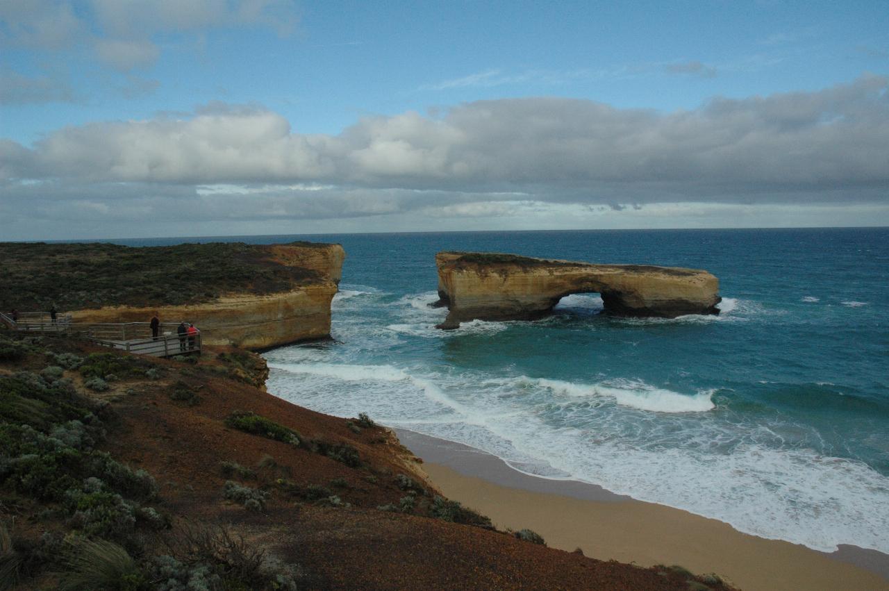 Small bay with peninsular which has been cut off from the shoreline by erosion
