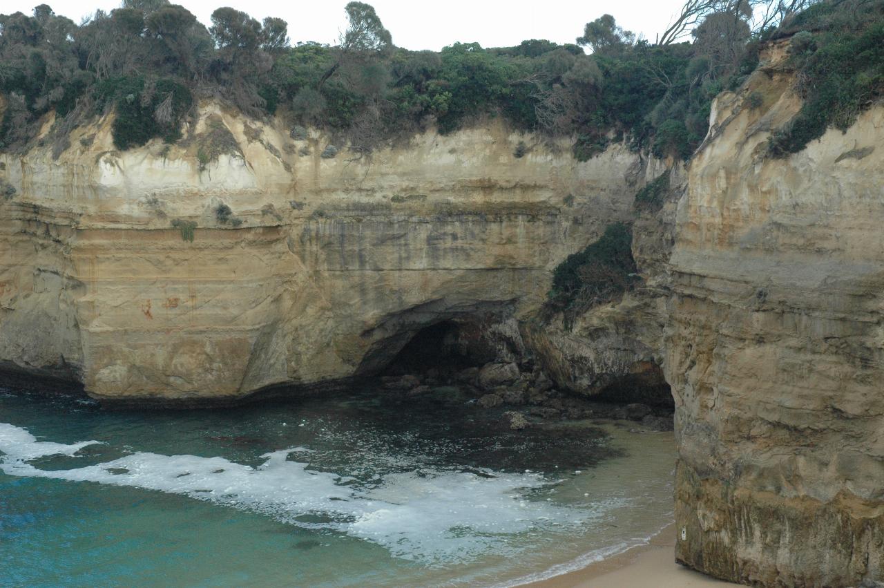 Tall cliffs with some erosion at the base from wave action