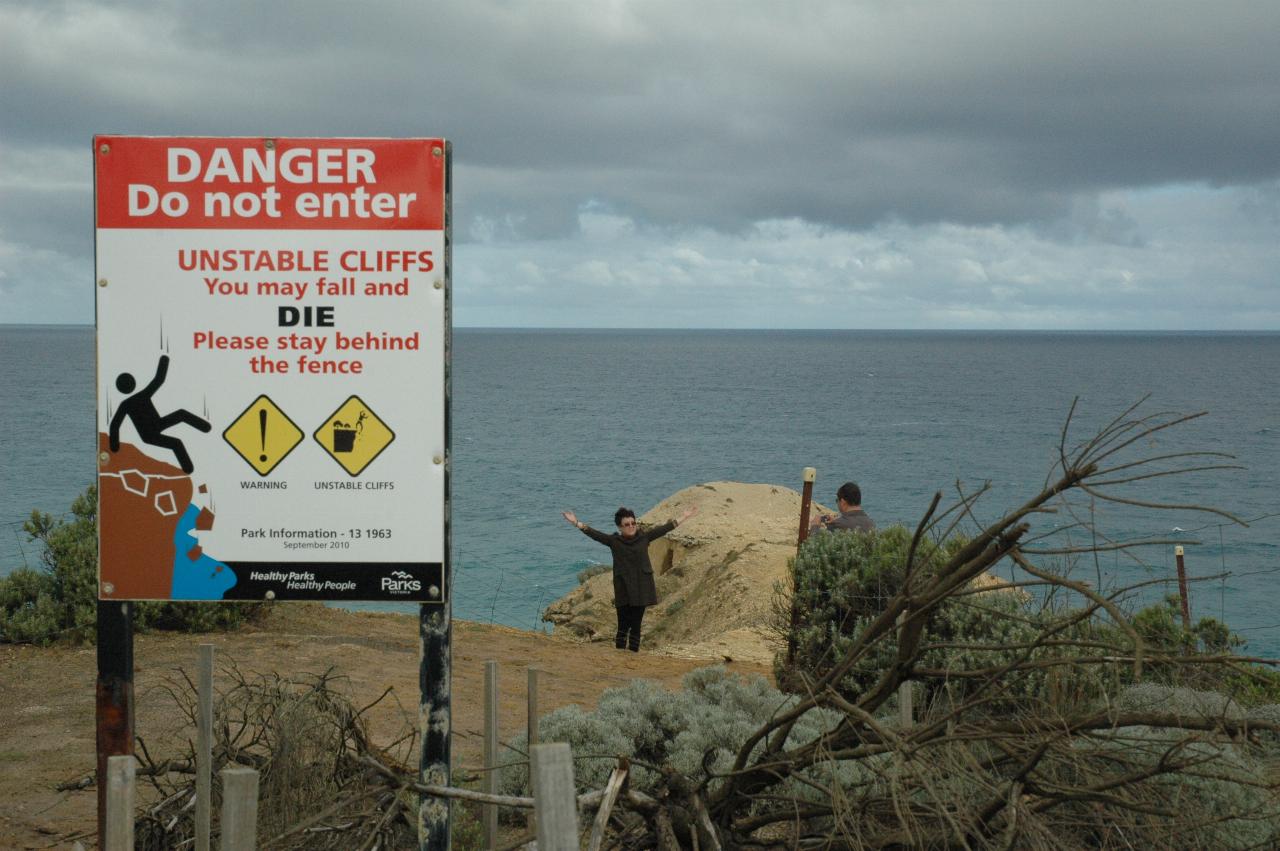 Do Not Enter sign with people who have entered the area