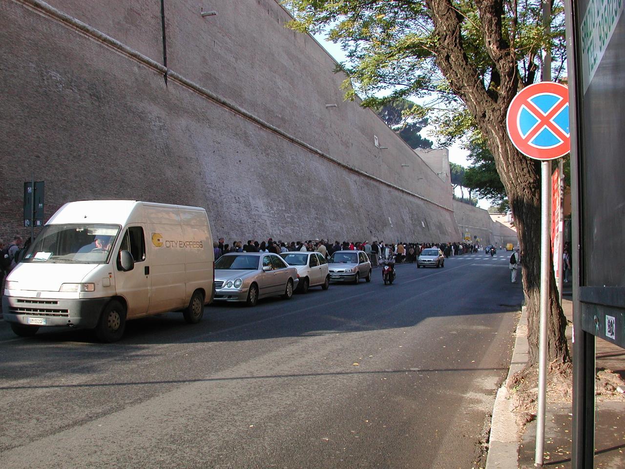 Queue waiting to enter Vatican Museum; Vatican walls on right