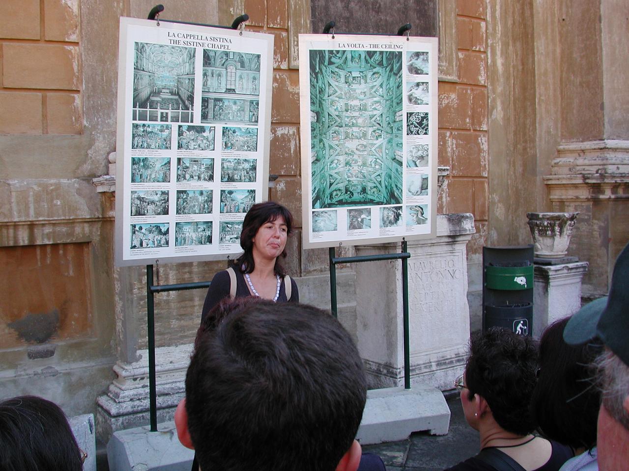 Paola (wonderful tour guide) in front of Sistine Chapel details