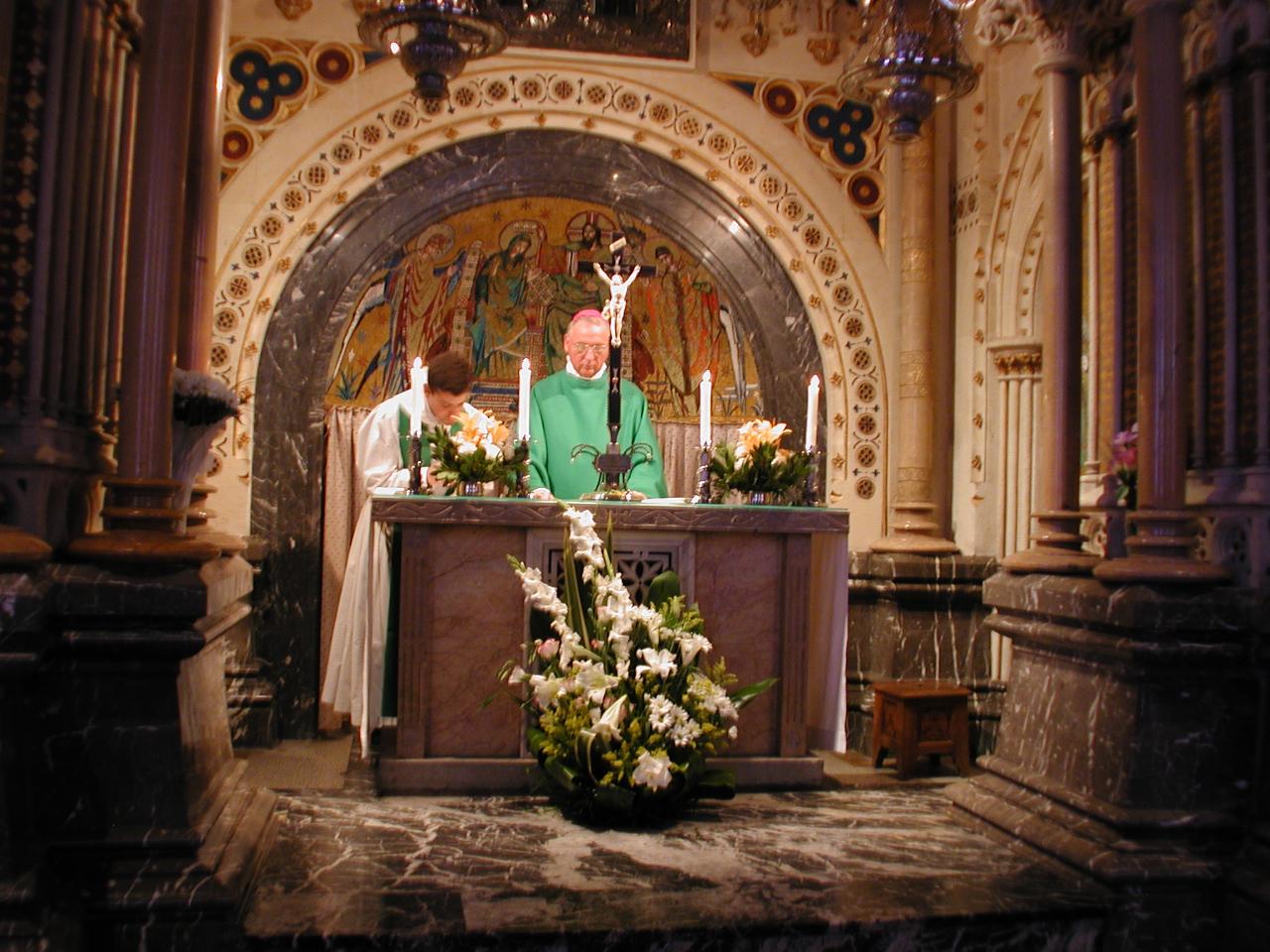 Mass in chapel at rear of main church, behind statue of the Black Madonna