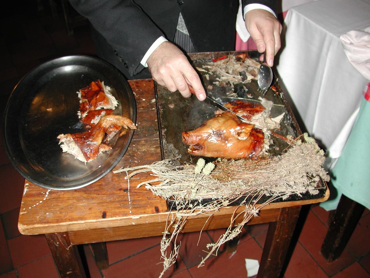 Suckling pig being carved