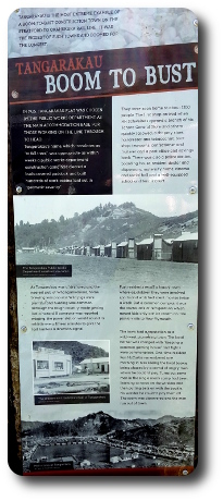 Sign describing construction camp boom to bust