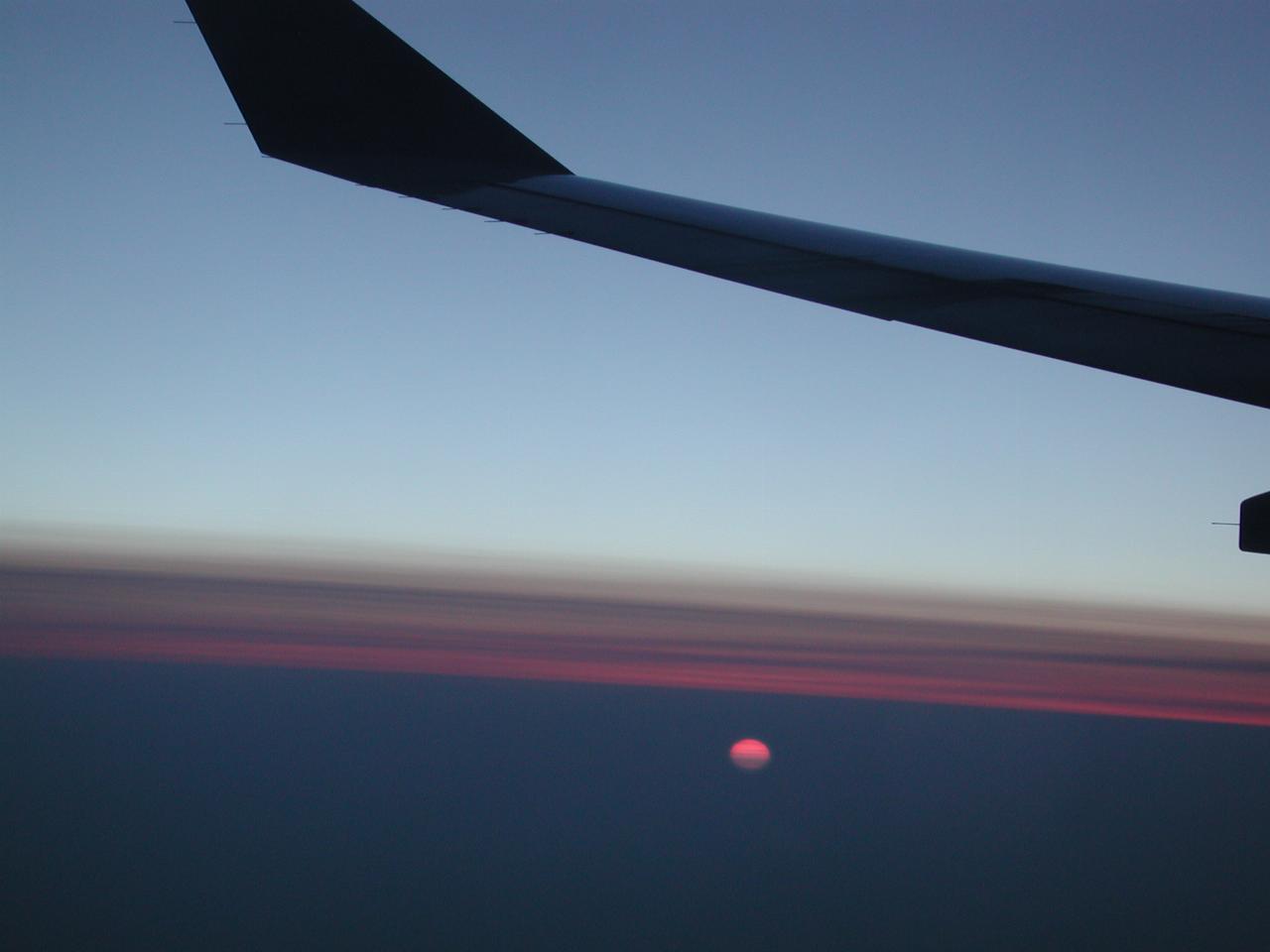 KPLU Viking Jazz: Sunset over northern Canada on way to Copenhagen