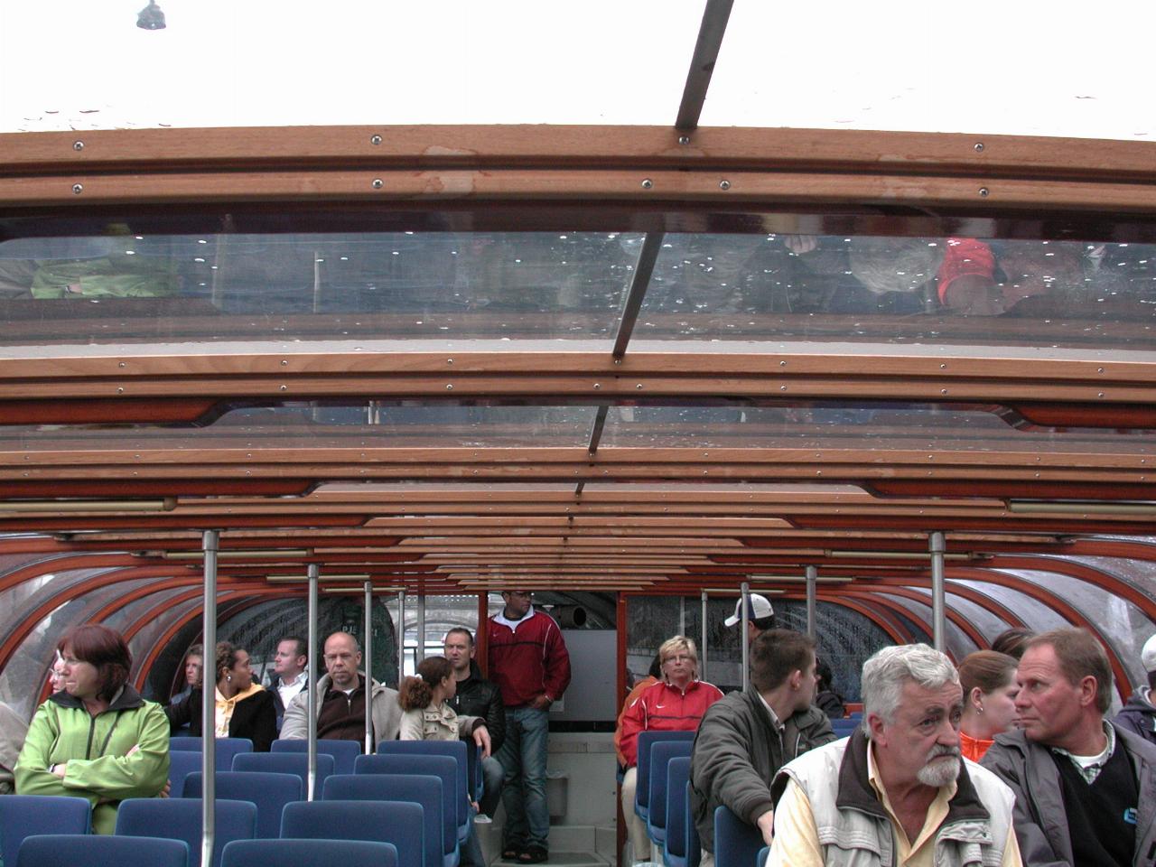KPLU Viking Jazz: Tour boat negotiating a low, narrow bridge with a sharp turn at the end