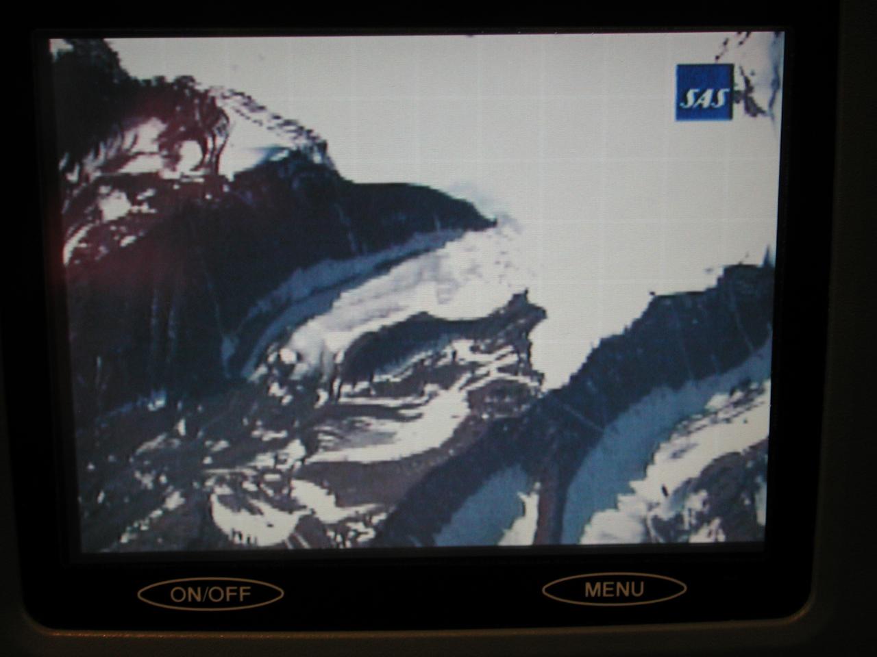 KPLU Viking Jazz: TV display at my seat of Greenland, as shown from plane's TV camera pointing down