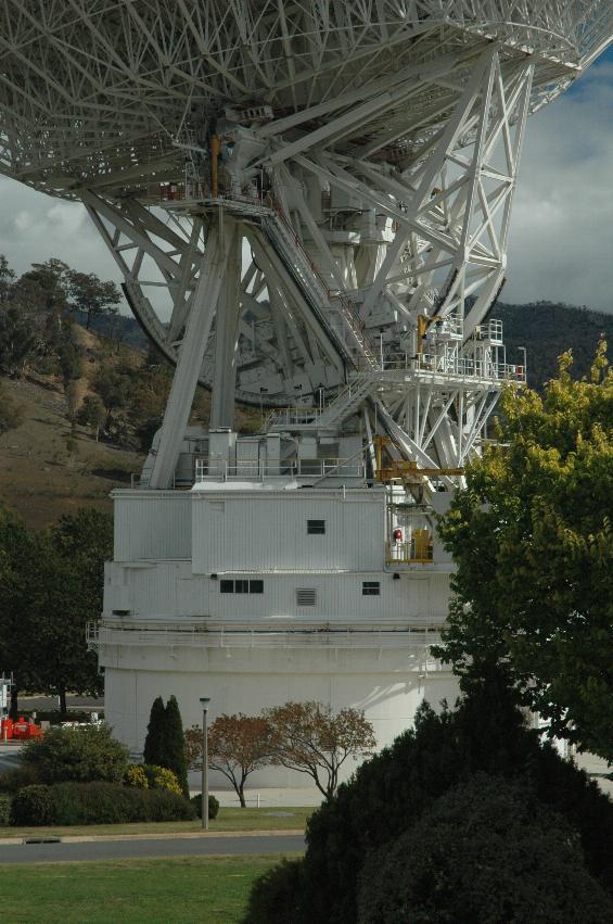Close up of large mechanism underneath above tracking dish