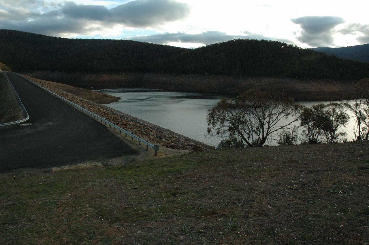 View of top of dam wall, upstream side and low water level